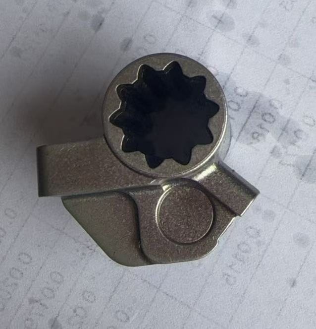 Stainless steel MIM part with internal spline and cam profile — metal injection molding component